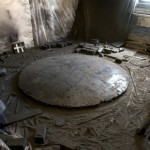 Studio view with Convex Coal Mirror (coal, 72 x 72 x 8 inches) on floor