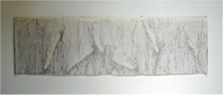 Dibujo táctil para ser creciente, carbón sobre tres capas de papel traslucido de 510 x 120 c.m, 2009